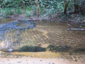 Kbal Spean-lingas and god carvings on river bed