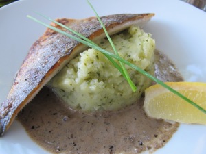 Grilled fish with tapenade sauce and herbed mashed potatoes